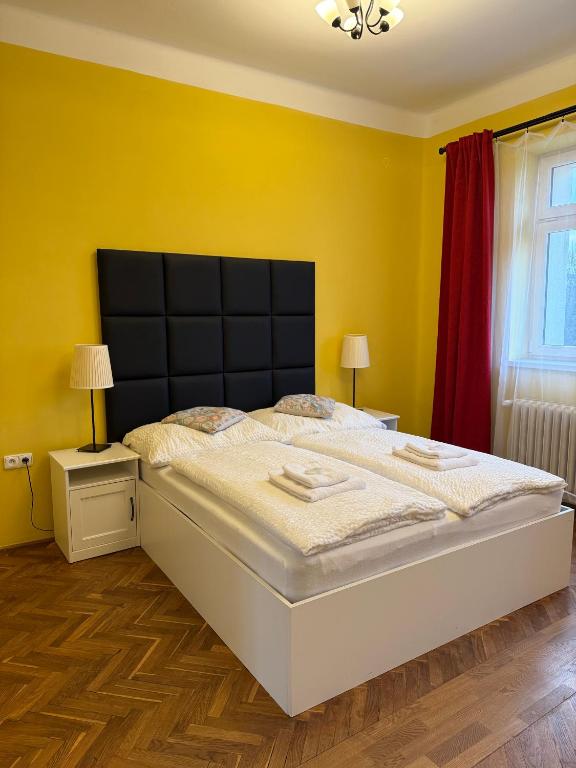 Postel nebo postele na pokoji v ubytování Penzion Radost