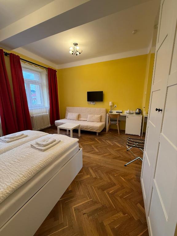 Postel nebo postele na pokoji v ubytování Penzion Radost