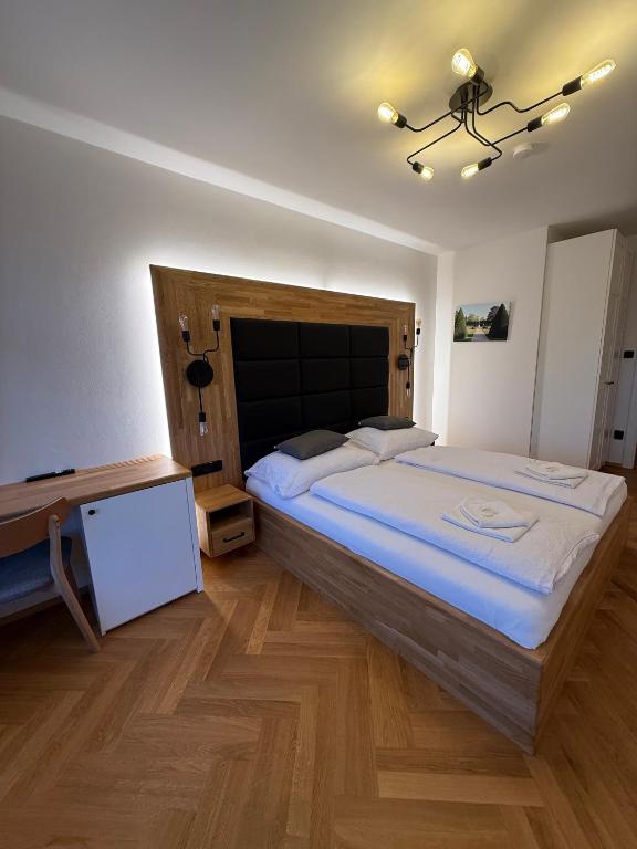 Postel nebo postele na pokoji v ubytování Penzion Radost