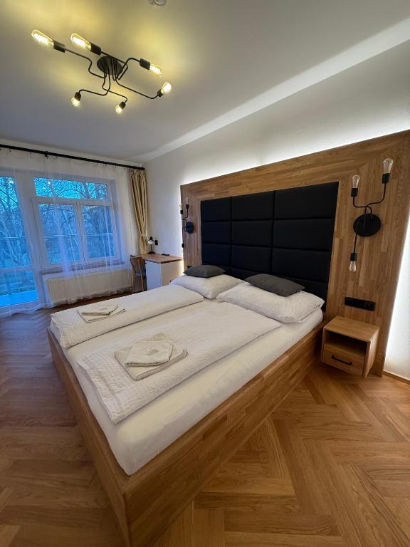 Postel nebo postele na pokoji v ubytování Penzion Radost