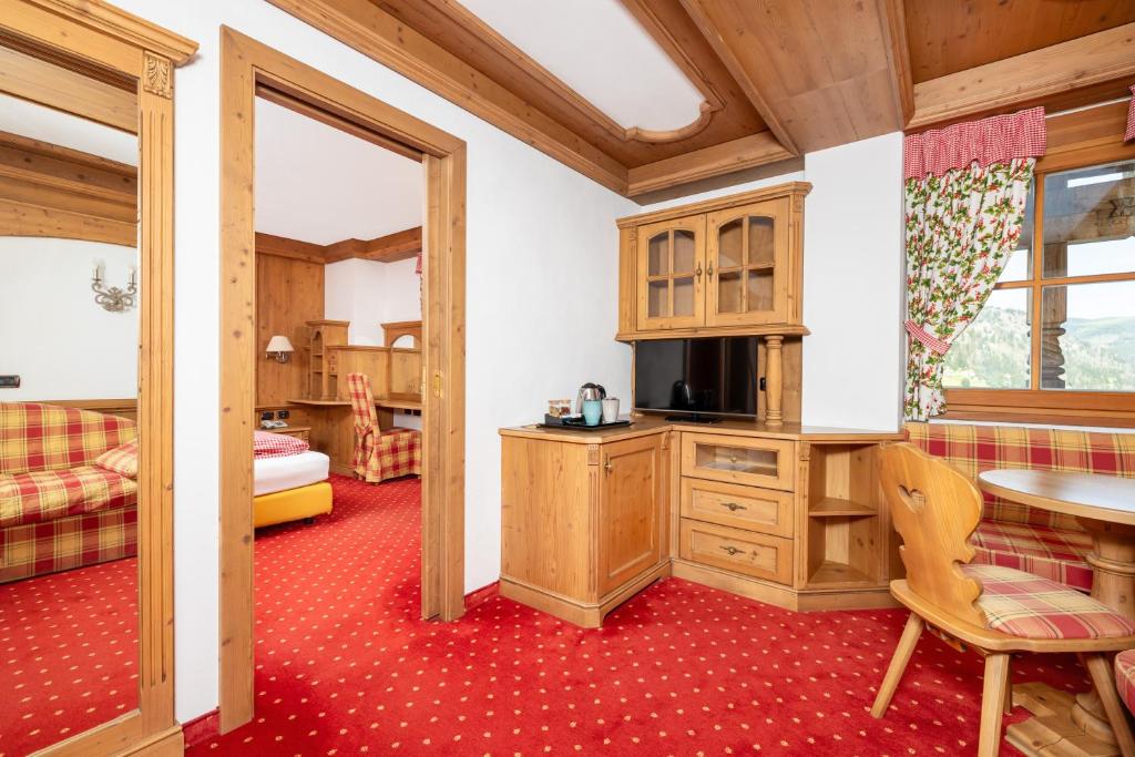 TV a/nebo společenská místnost v ubytování Chalet Barbara