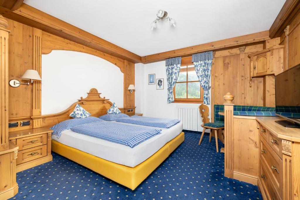 Postel nebo postele na pokoji v ubytování Chalet Barbara