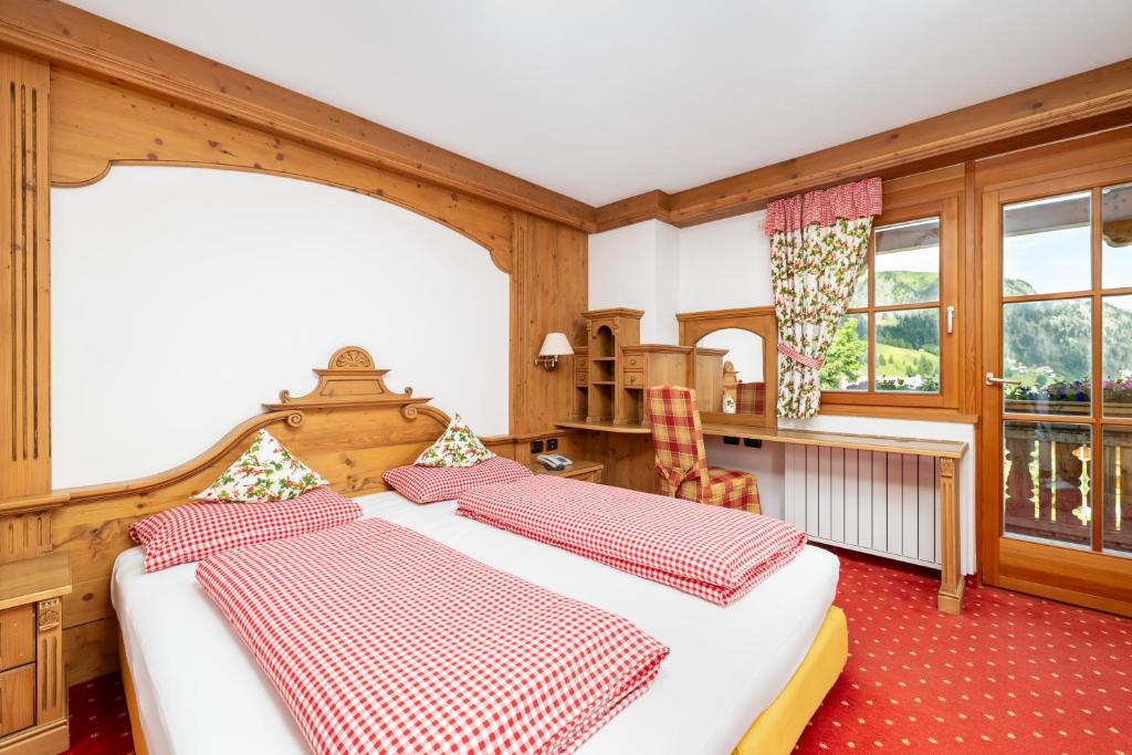 Postel nebo postele na pokoji v ubytování Chalet Barbara