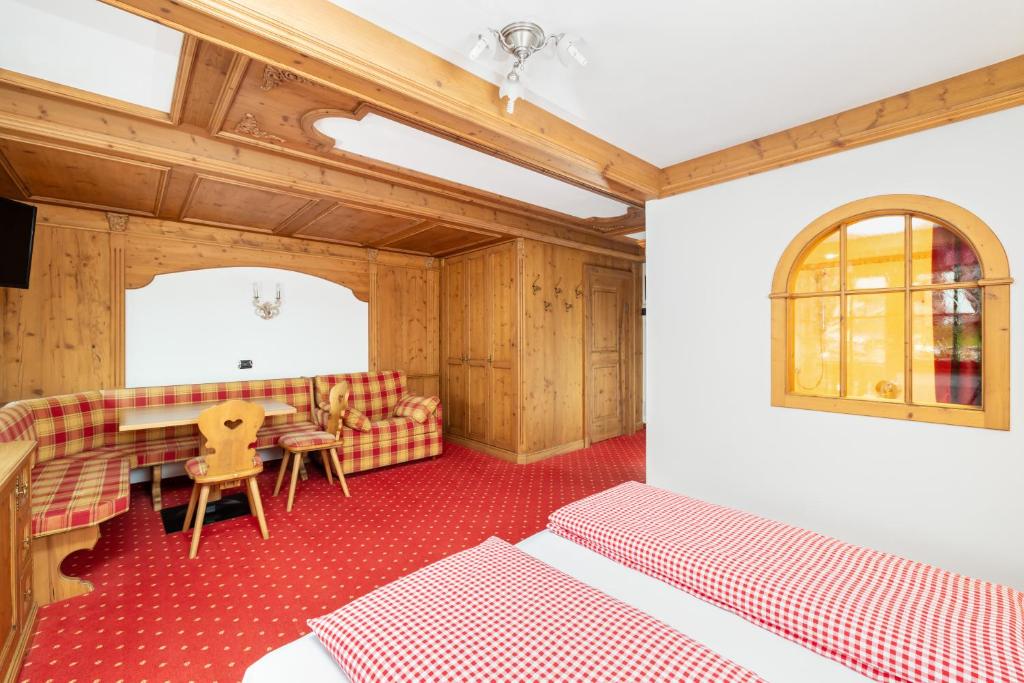 Postel nebo postele na pokoji v ubytování Chalet Barbara