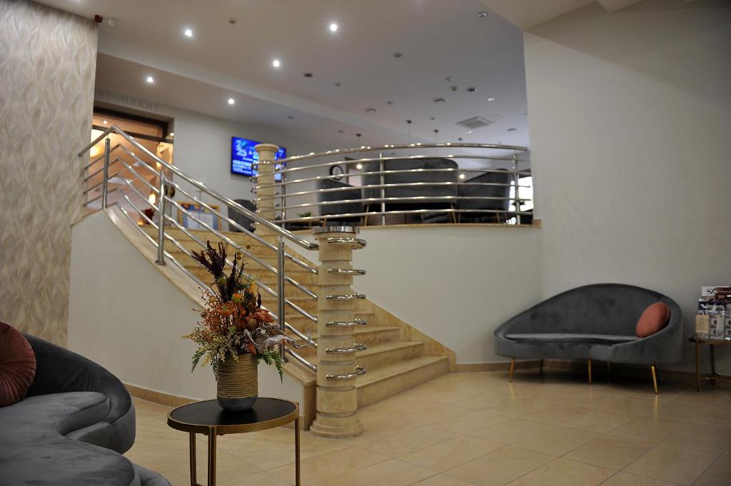 Posezení v ubytování Hotel Három Gúnár