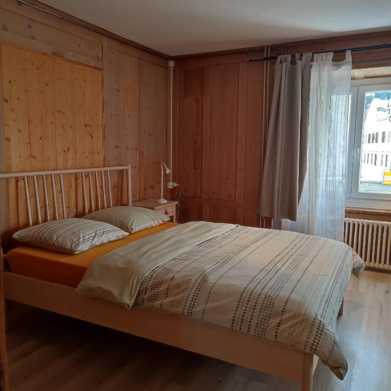 Postel nebo postele na pokoji v ubytování Haus Albula 2