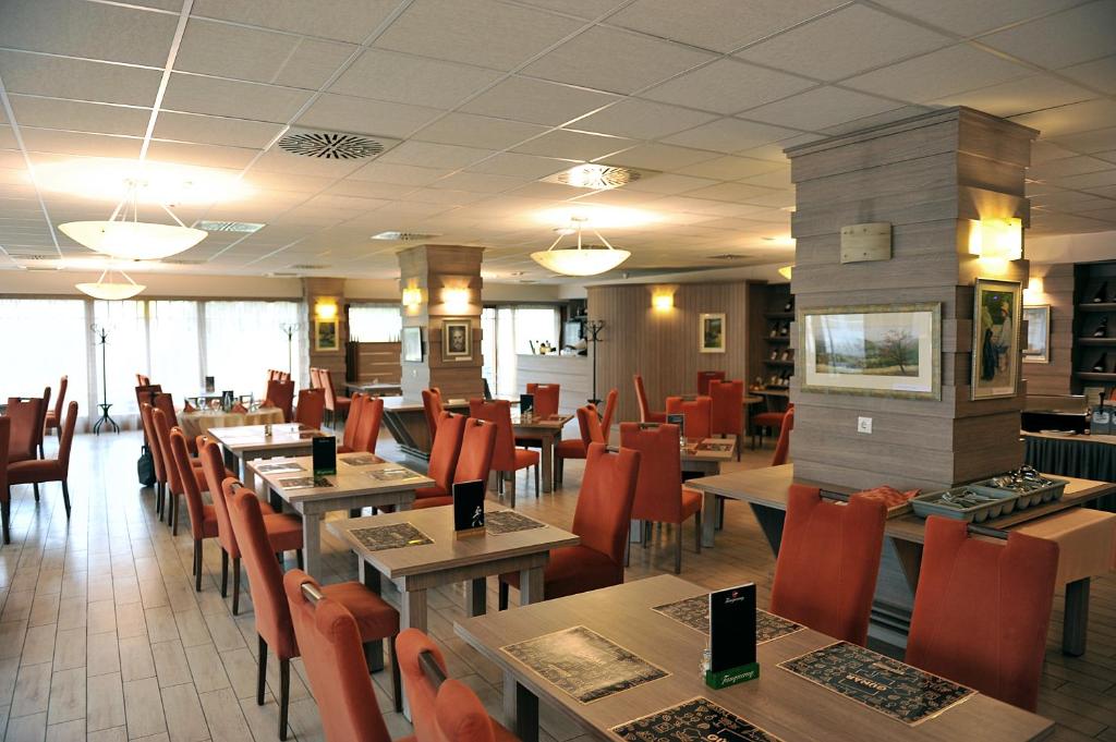 Posezení v ubytování Hotel Három Gúnár
