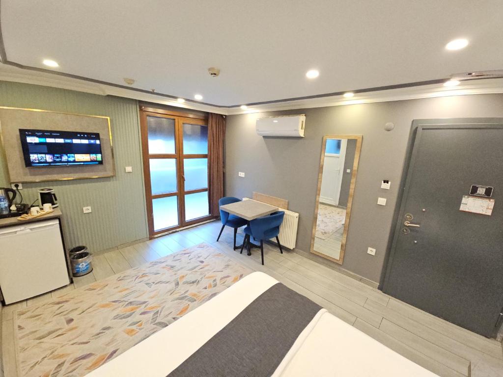 Kuchyň nebo kuchyňský kout v ubytování Sahrakent Otel Pendik