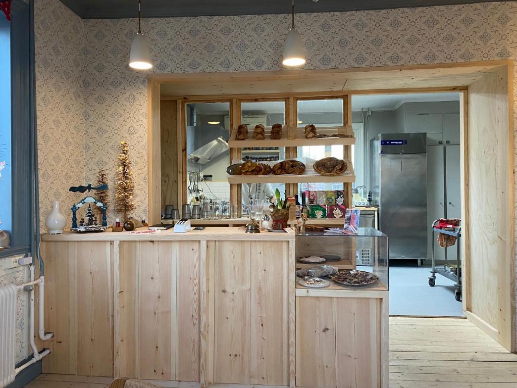 Kuchyň nebo kuchyňský kout v ubytování Hedvigs Restaurang