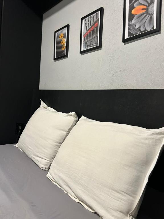 Postel nebo postele na pokoji v ubytování Suites Santa Noche & Spa
