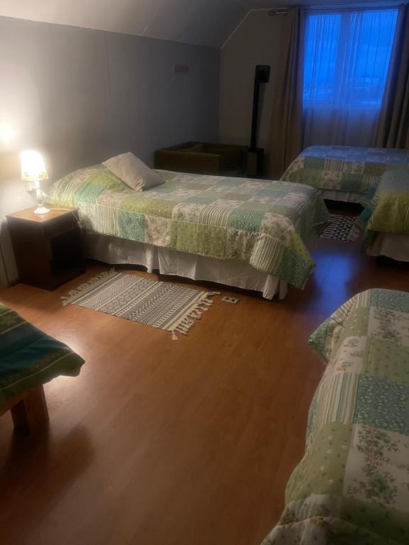 Postel nebo postele na pokoji v ubytování Hospedaje de la vita