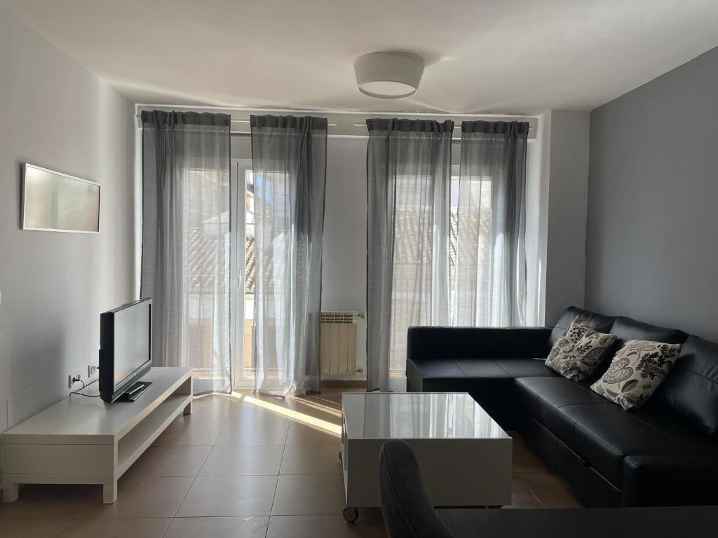 A seating area at Apartamento En El Centro De Ronda