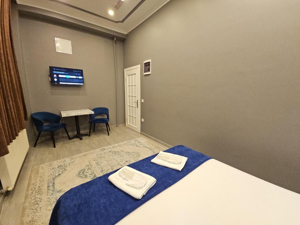 Postel nebo postele na pokoji v ubytování Sahrakent Otel Pendik
