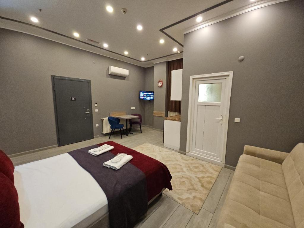 Postel nebo postele na pokoji v ubytování Sahrakent Otel Pendik