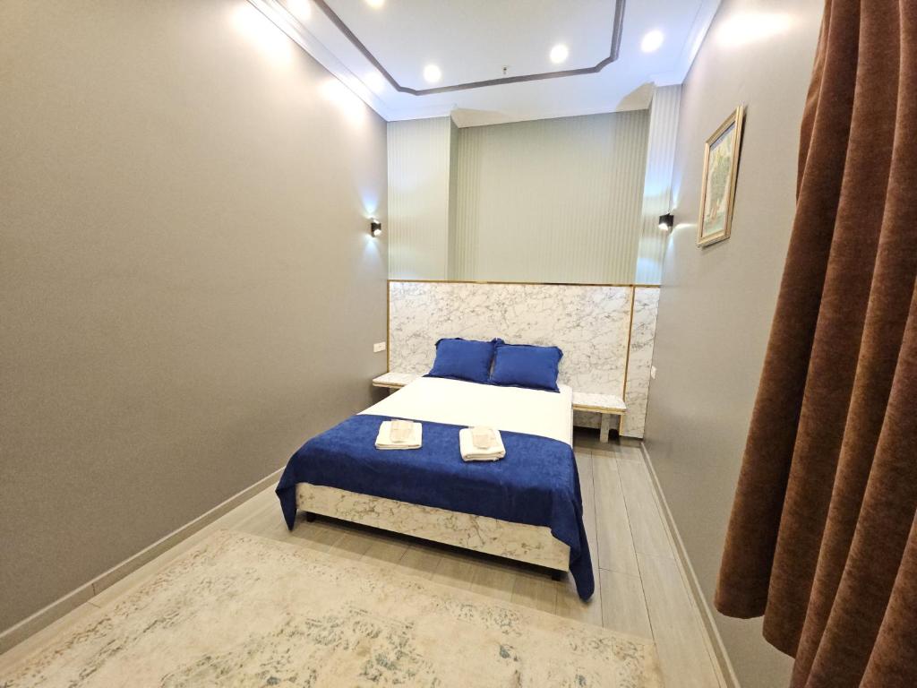 Postel nebo postele na pokoji v ubytování Sahrakent Otel Pendik