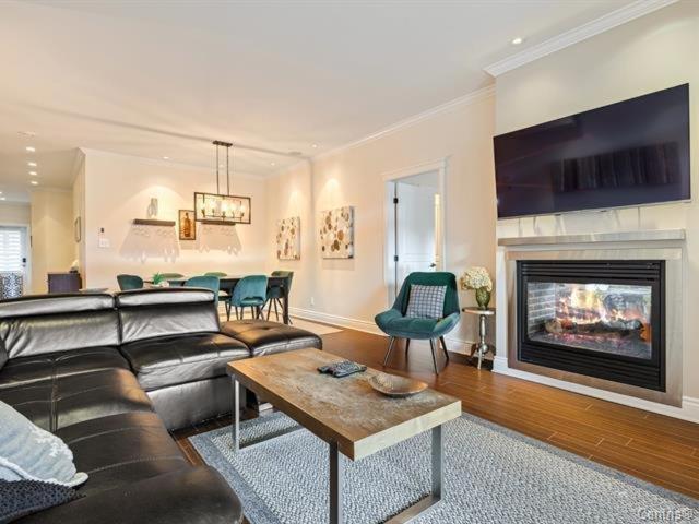 TV a/nebo společenská místnost v ubytování Condo-hôtel Le Champlain - Condo103 Bromont