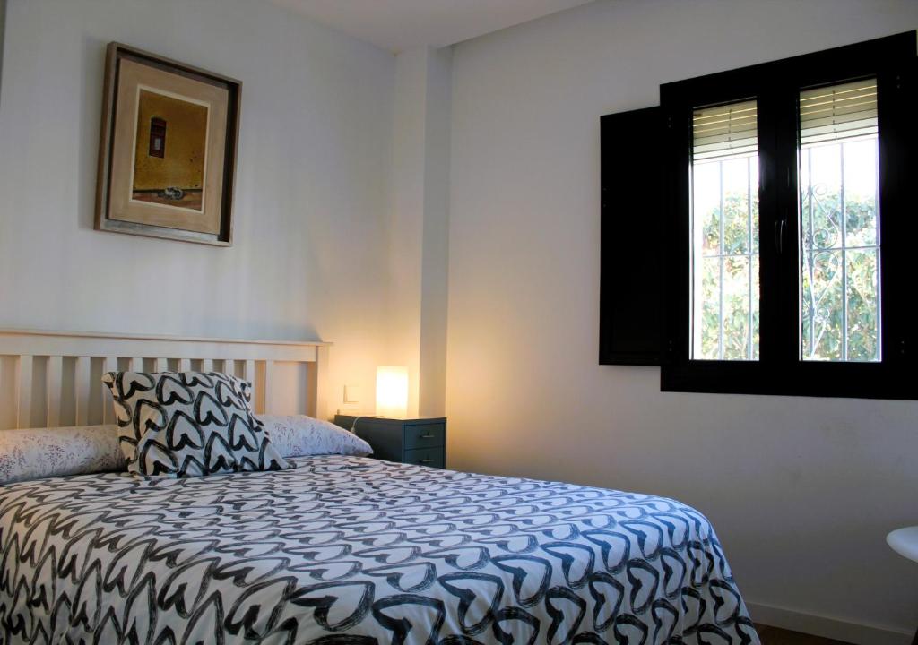 Posteľ alebo postele v izbe v ubytovaní CASA MOLINERO con encanto y maravillosa terraza con vistas VFT/CA/05921