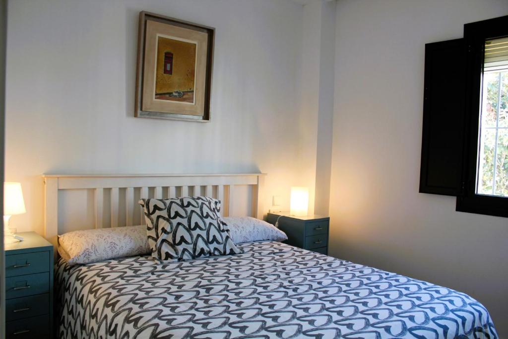 Posteľ alebo postele v izbe v ubytovaní CASA MOLINERO con encanto y maravillosa terraza con vistas VFT/CA/05921