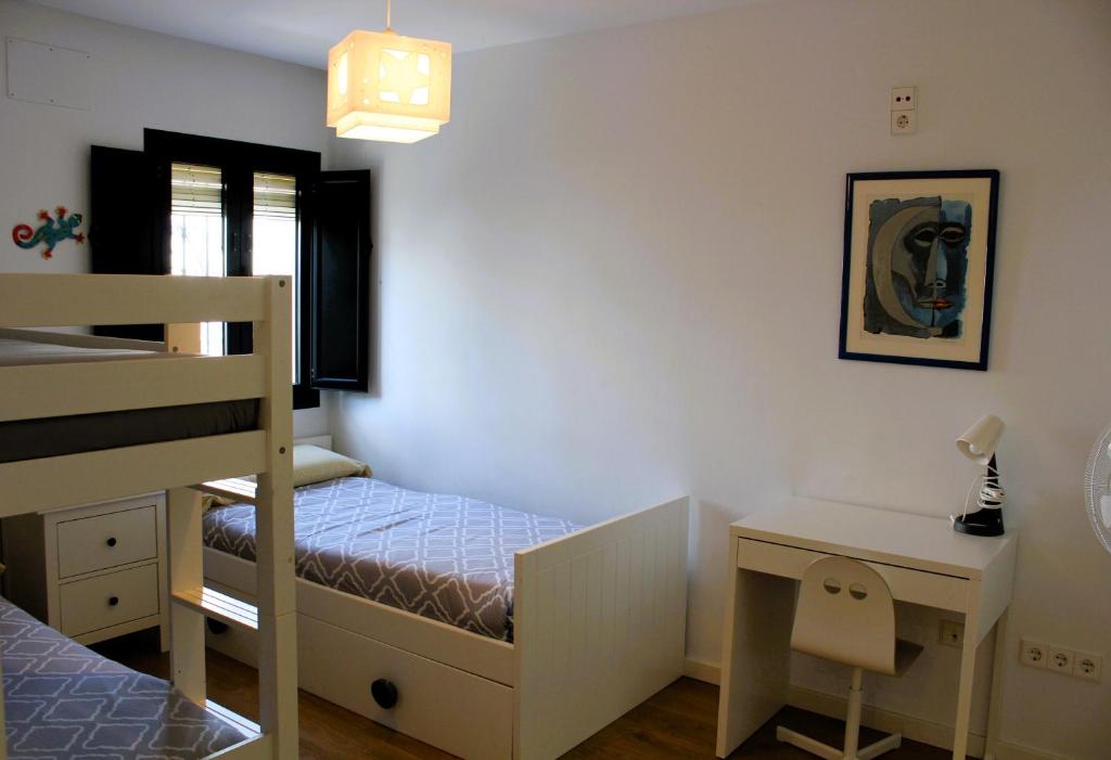 Posteľ alebo postele v izbe v ubytovaní CASA MOLINERO con encanto y maravillosa terraza con vistas VFT/CA/05921