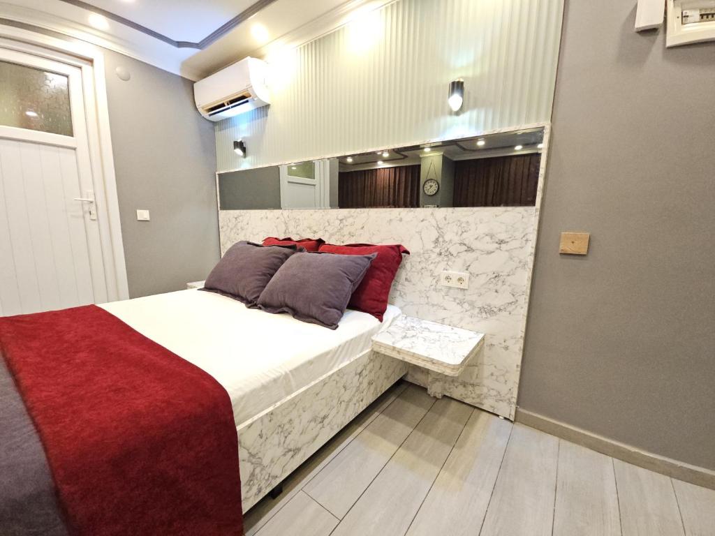 Postel nebo postele na pokoji v ubytování Sahrakent Otel Pendik
