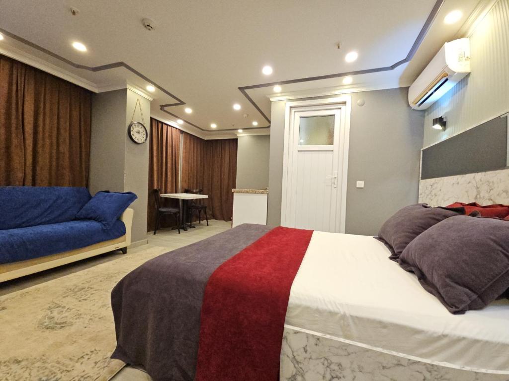 Postel nebo postele na pokoji v ubytování Sahrakent Otel Pendik