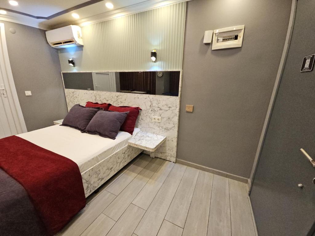 Postel nebo postele na pokoji v ubytování Sahrakent Otel Pendik