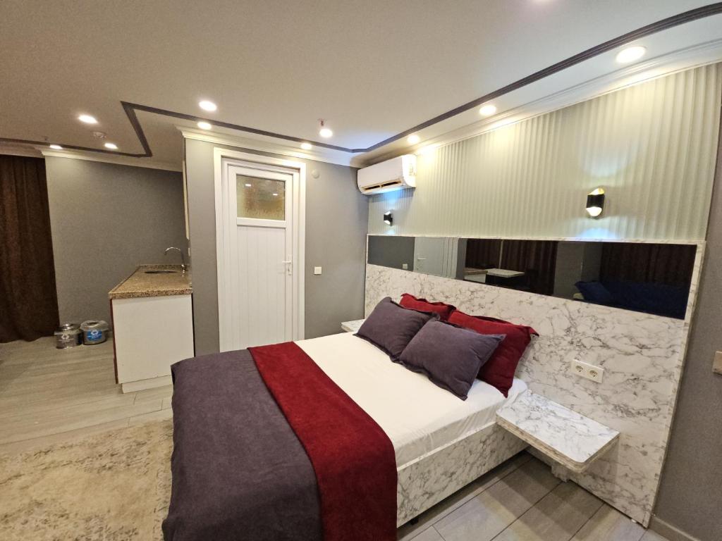 Postel nebo postele na pokoji v ubytování Sahrakent Otel Pendik