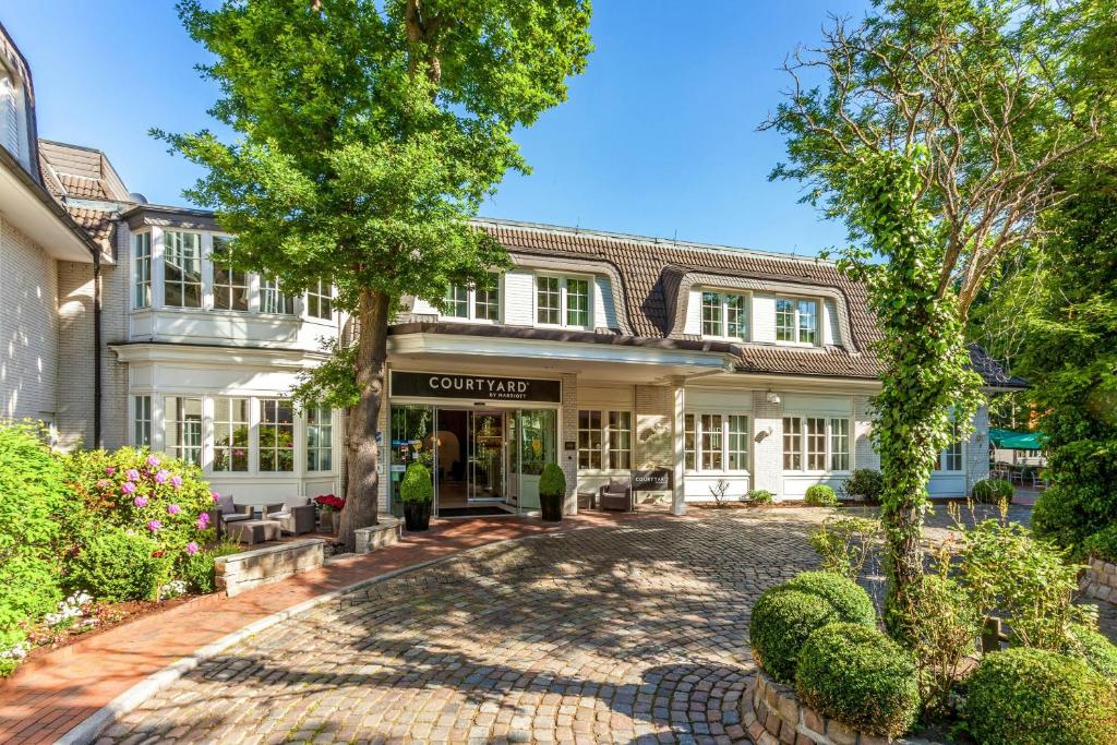 Courtyard by Marriott Hamburg Airport - Resim 7