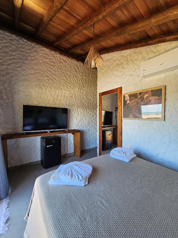 Postel nebo postele na pokoji v ubytování Pousada Suyhê