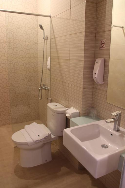 Koupelna v ubytování Tlogomas Guest House