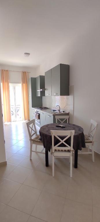 Kuchyň nebo kuchyňský kout v ubytování Affittasi appartamento per vacanze