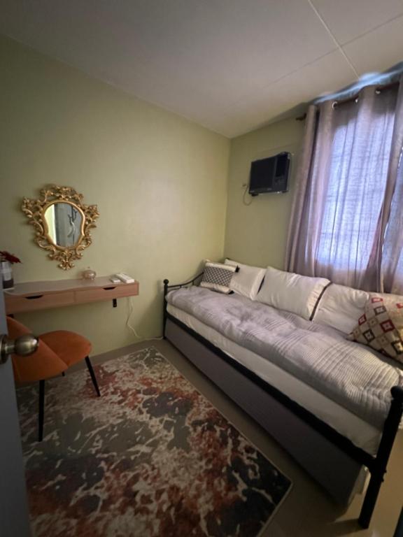 Posezení v ubytování MisyEdz Homes Clark Dau