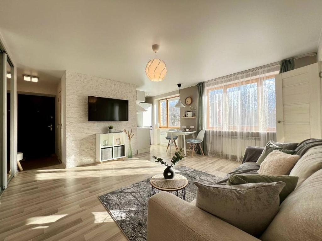Posezení v ubytování Comfort Apartment In Narva City Center