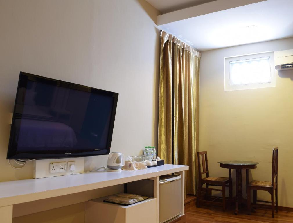 TV a/nebo společenská místnost v ubytování Jonker Boutique Hotel