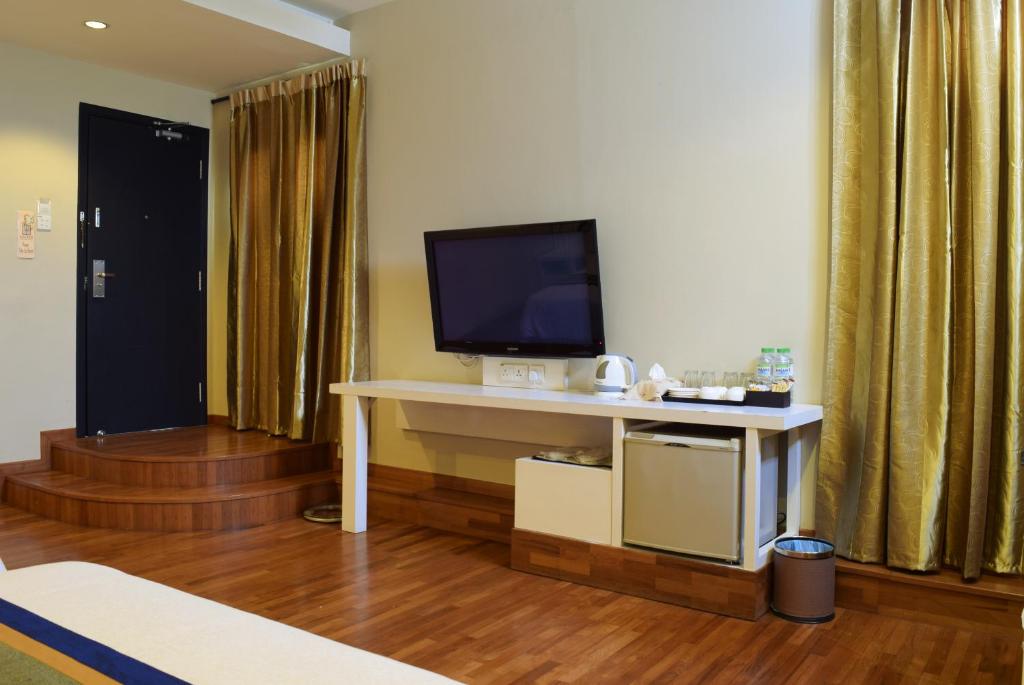 TV a/nebo společenská místnost v ubytování Jonker Boutique Hotel