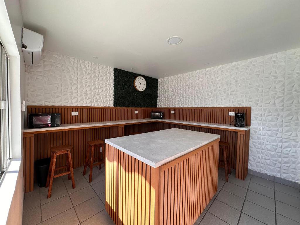 TV a/nebo společenská místnost v ubytování Hotel Guillen