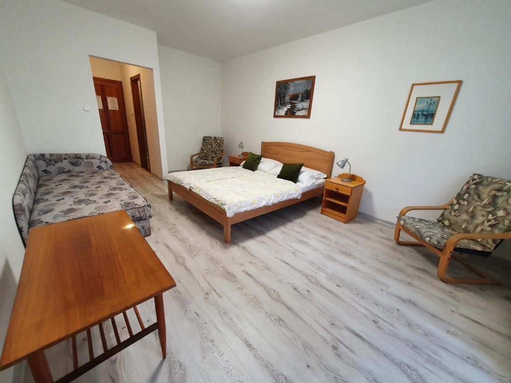 Postel nebo postele na pokoji v ubytování Arizona apartman