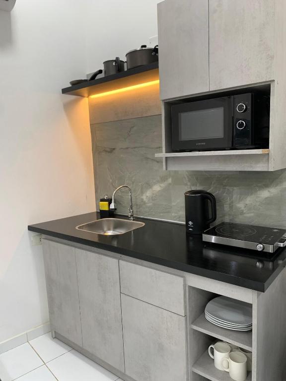 Kuchyň nebo kuchyňský kout v ubytování Monoambiente en Pilar, Ñeembucú