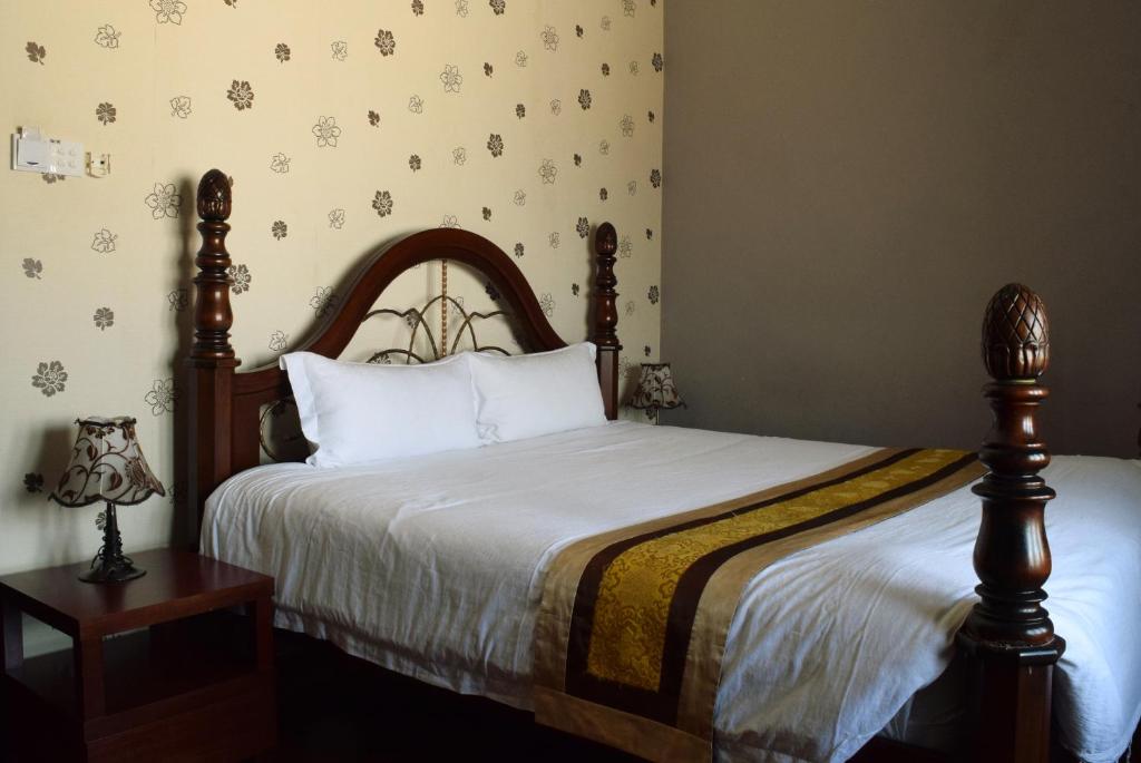 Postel nebo postele na pokoji v ubytování Jonker Boutique Hotel