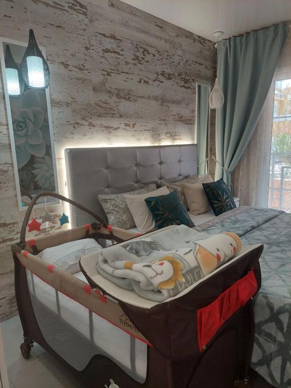 Posteľ alebo postele v izbe v ubytovaní ORLANDO LUXURY APARTAMENT