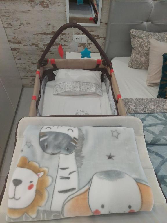 Posteľ alebo postele v izbe v ubytovaní ORLANDO LUXURY APARTAMENT