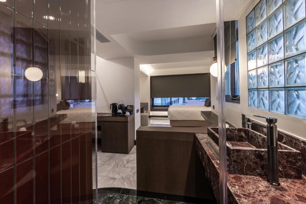 Kuchyň nebo kuchyňský kout v ubytování L'Avventura Suites