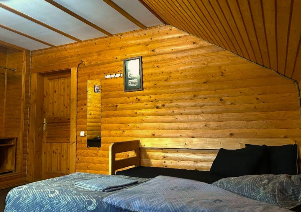 Postel nebo postele na pokoji v ubytování Готель Могул