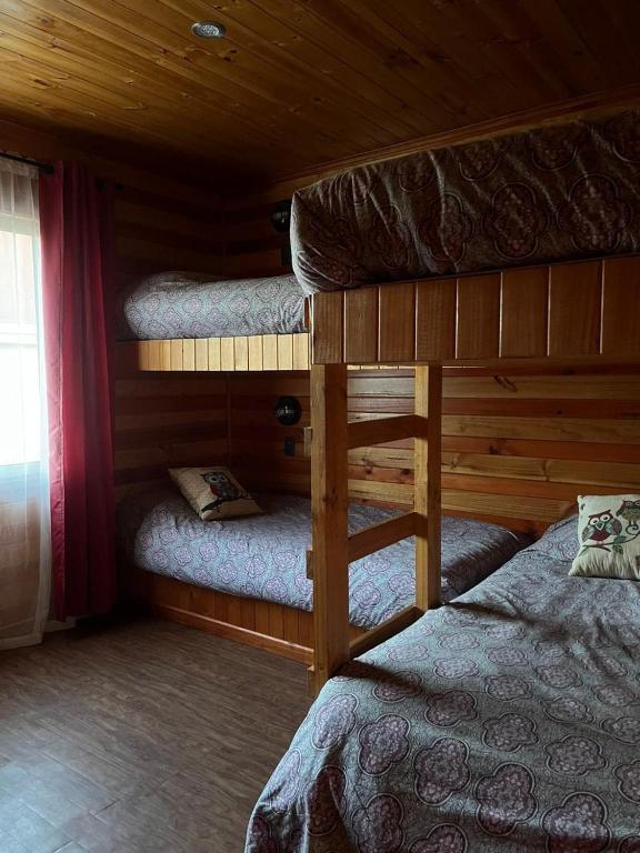 Postel nebo postele na pokoji v ubytování Algarrobo Lodge