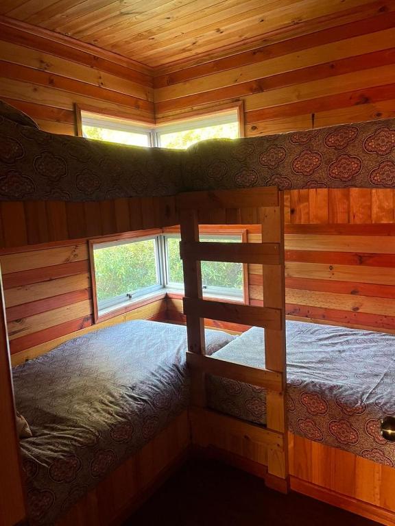 Postel nebo postele na pokoji v ubytování Algarrobo Lodge