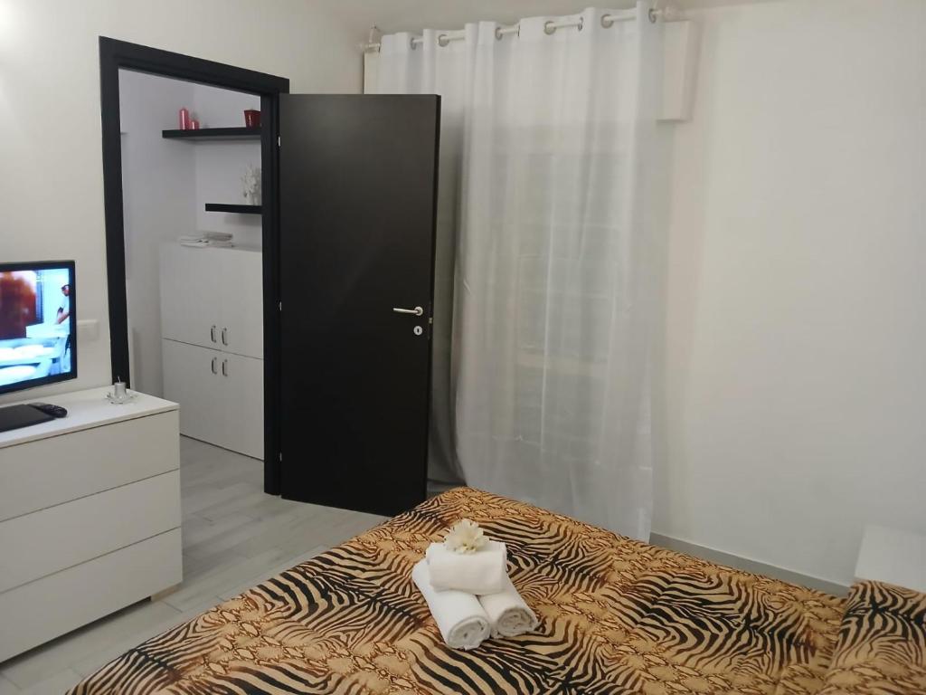 Postel nebo postele na pokoji v ubytování Molly's Appartment