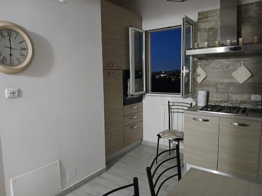 Kuchyň nebo kuchyňský kout v ubytování Molly's Appartment