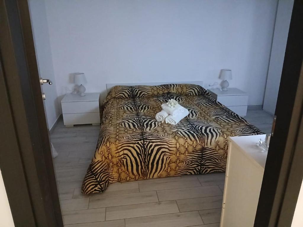Postel nebo postele na pokoji v ubytování Molly's Appartment