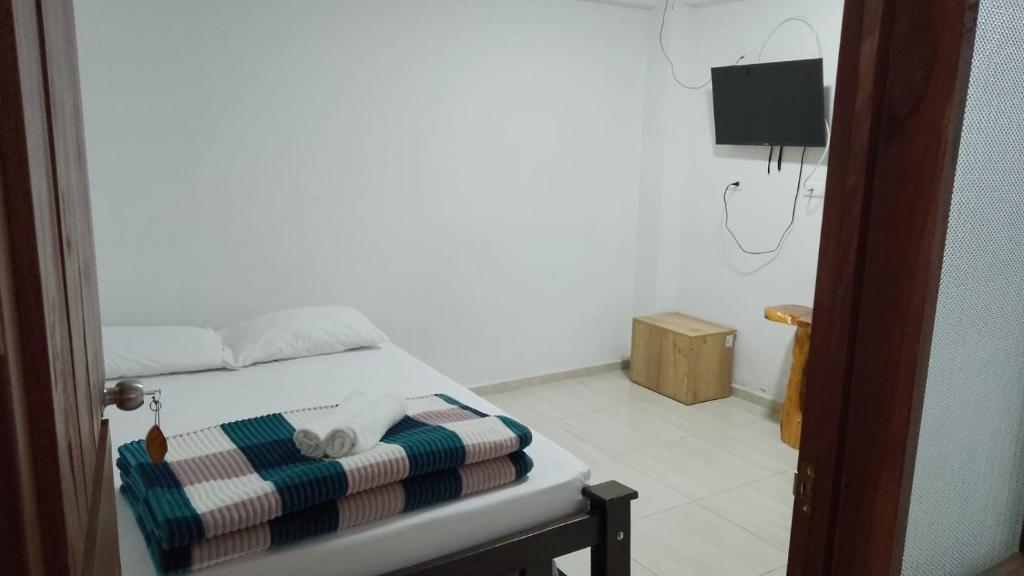 TV a/nebo společenská místnost v ubytování hospedage murillo