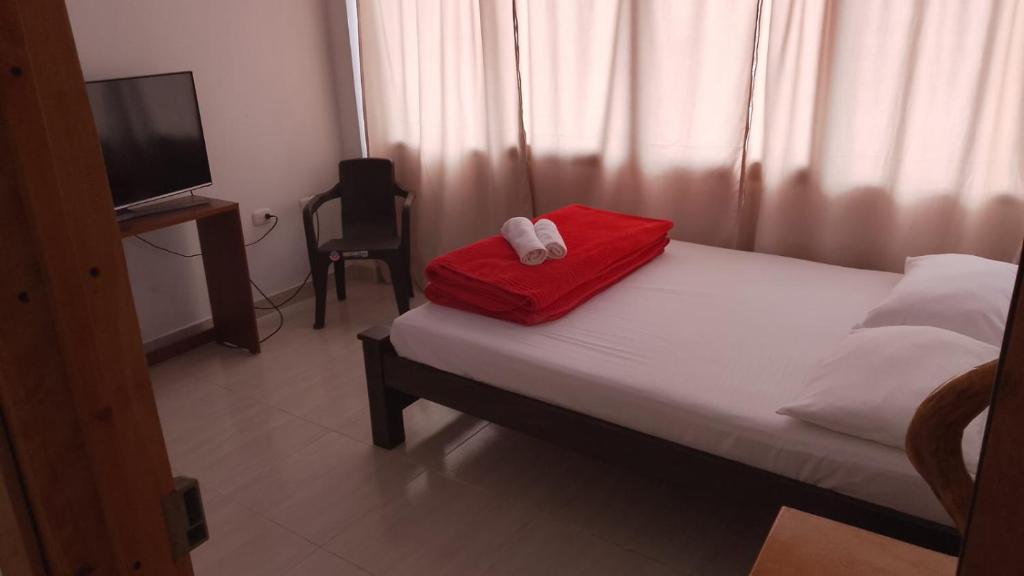 Postel nebo postele na pokoji v ubytování hospedage murillo